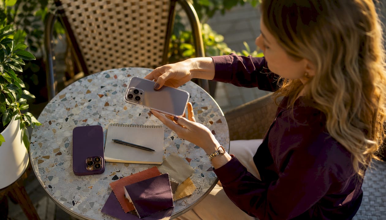 Woman comparing TPU and silicone phone cases