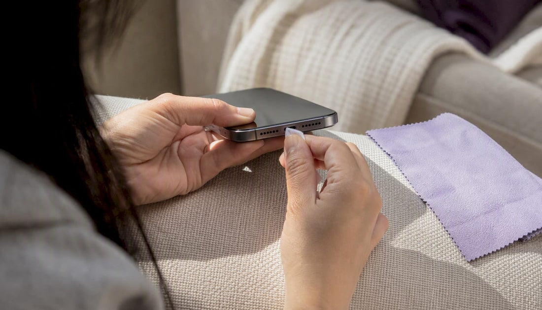 Hands testing phone microphone with case off