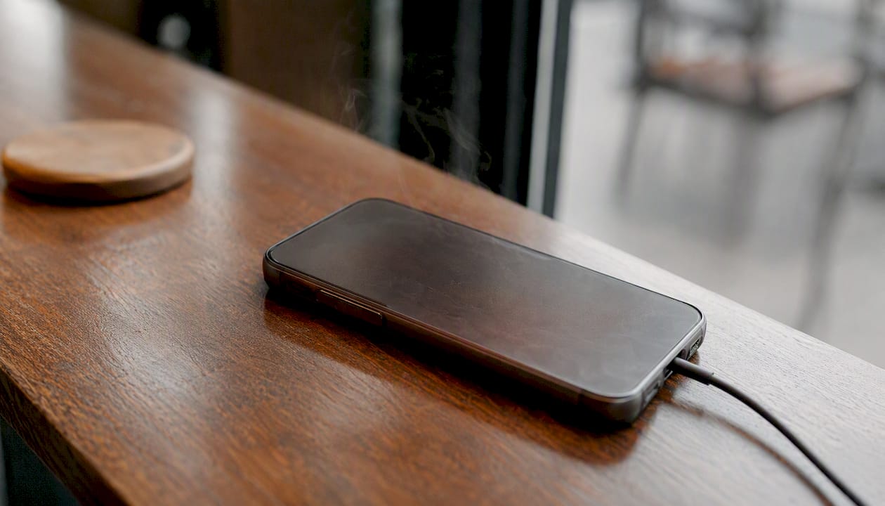 Close-up of smartphone with translucent protective case showing heat effect