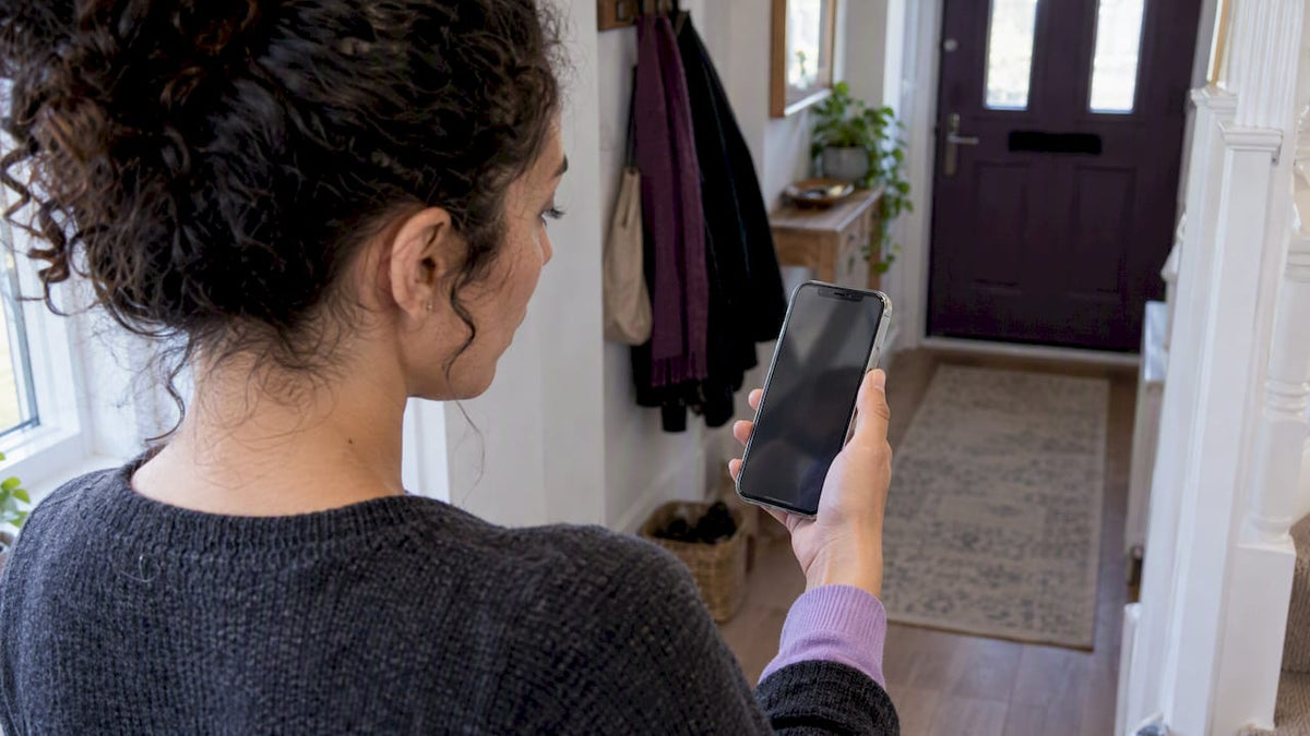User checking Face ID on a protected iPhone